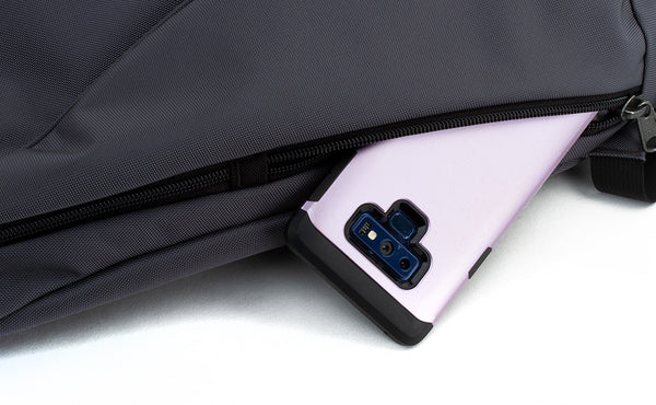 A phone in the small side pocket.